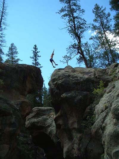 Jumping between some rocks, near The Box, East Fork of the Jemez River.